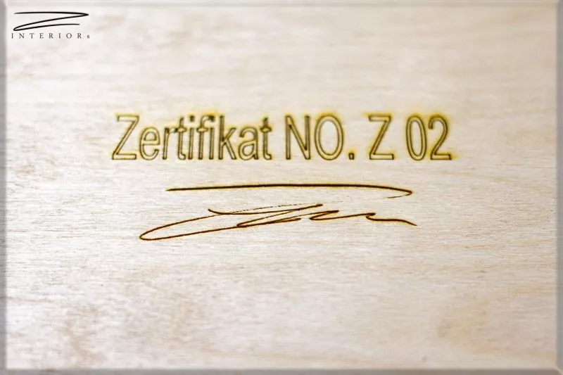 Designgürtel Z 02 Beispielbild mit individueller Gravur für die Schatulle.